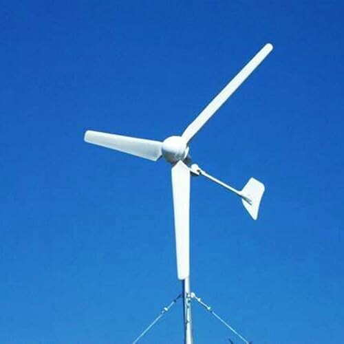Small wind turbine against a clear blue sky