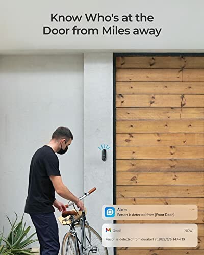 Person with bicycle receiving smart doorbell notification.